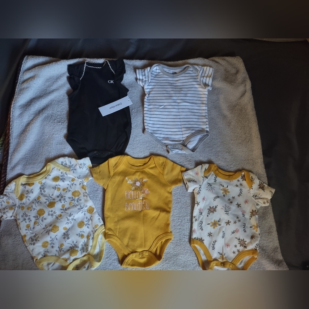 Calvin Klein Black and White Striped Baby Bodysuit
